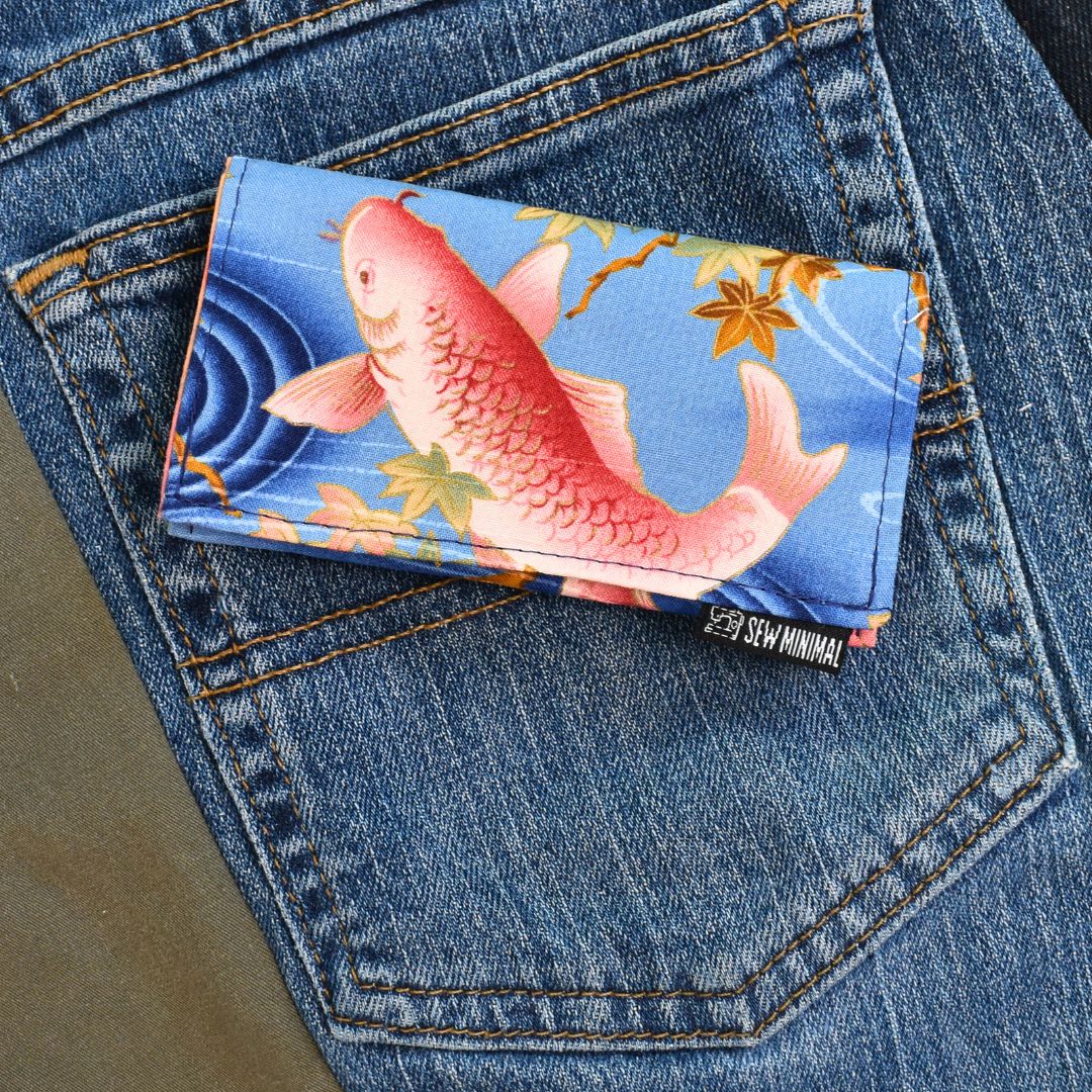 pink and blue koi pond print card carrier