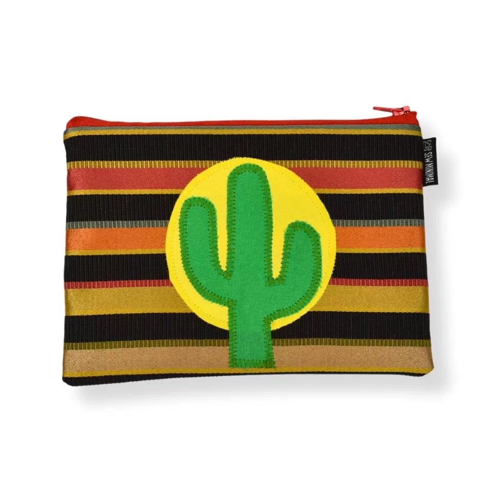 A small brown and red striped fabric zipper pouch with a green cactus and yellow sun applique.